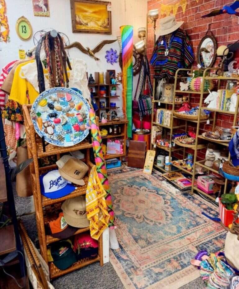 Thanks It's Vintage booth at Twisted Sisters Vintage Market, with vintage clothing, hats, ponchos and eclectic decor