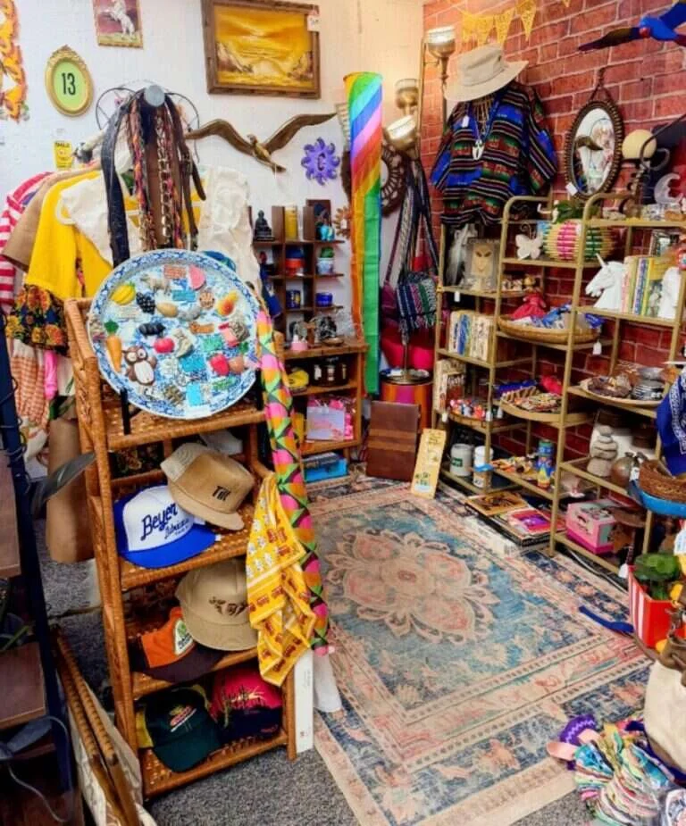 Thanks It's Vintage booth at Twisted Sisters Vintage Market, with vintage clothing, hats, ponchos and eclectic decor